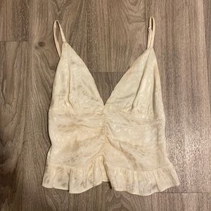 Isabelle’s cabinet satin cheetah top